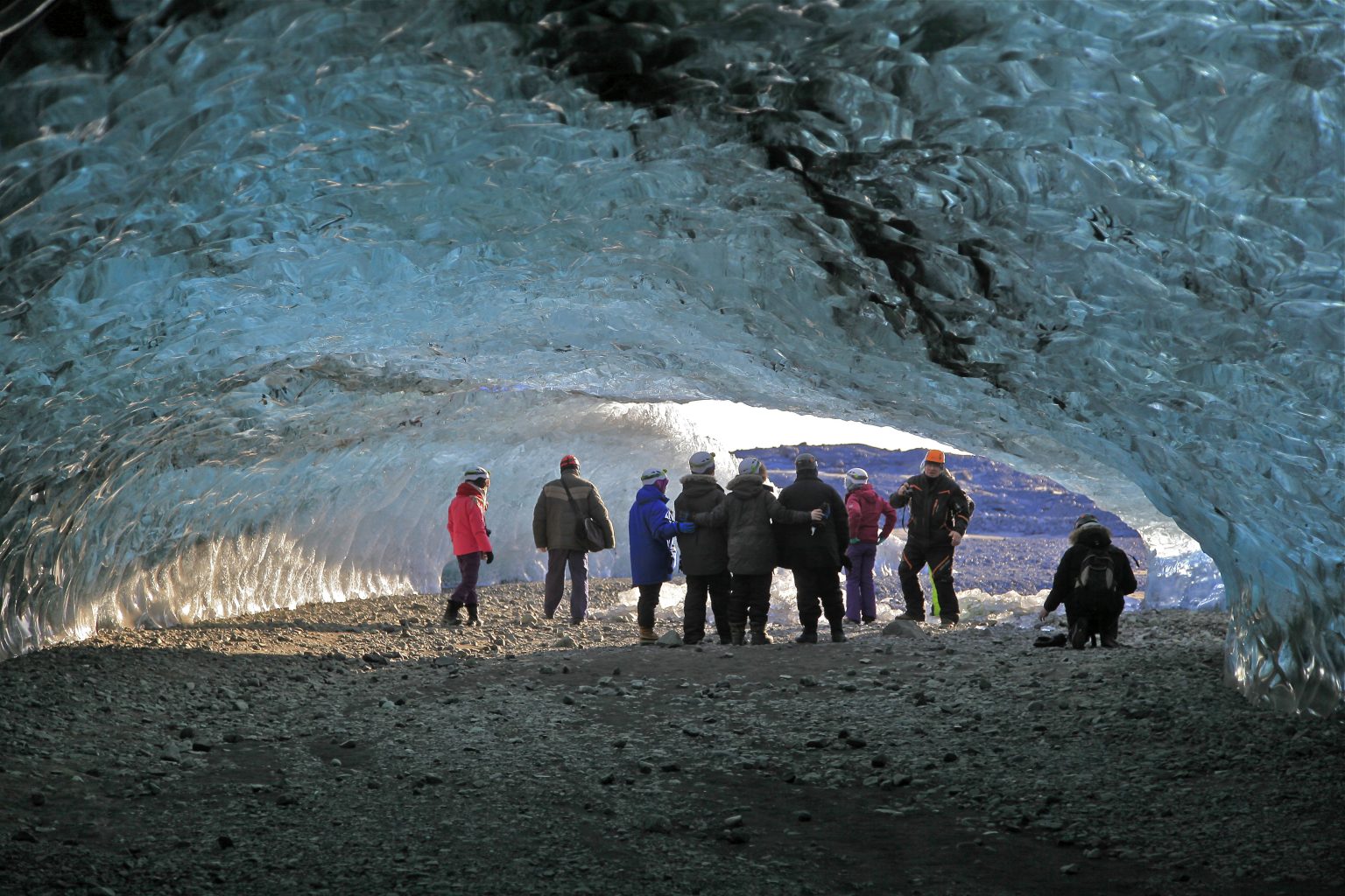 Group in ice cave - Blue Iceland glacier tour, Vatnajökull, Iceland.